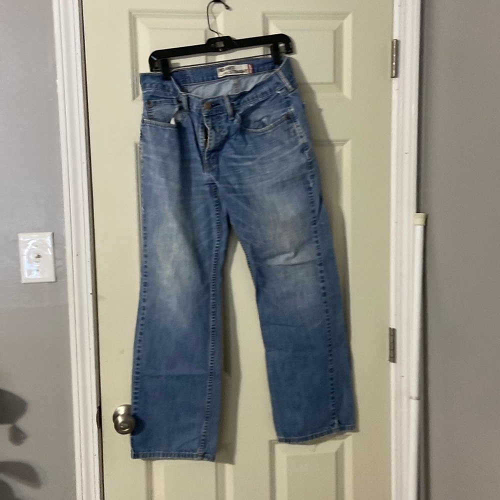 Men’s relaxed fit Levi’s. Well broken in but no tears or holes